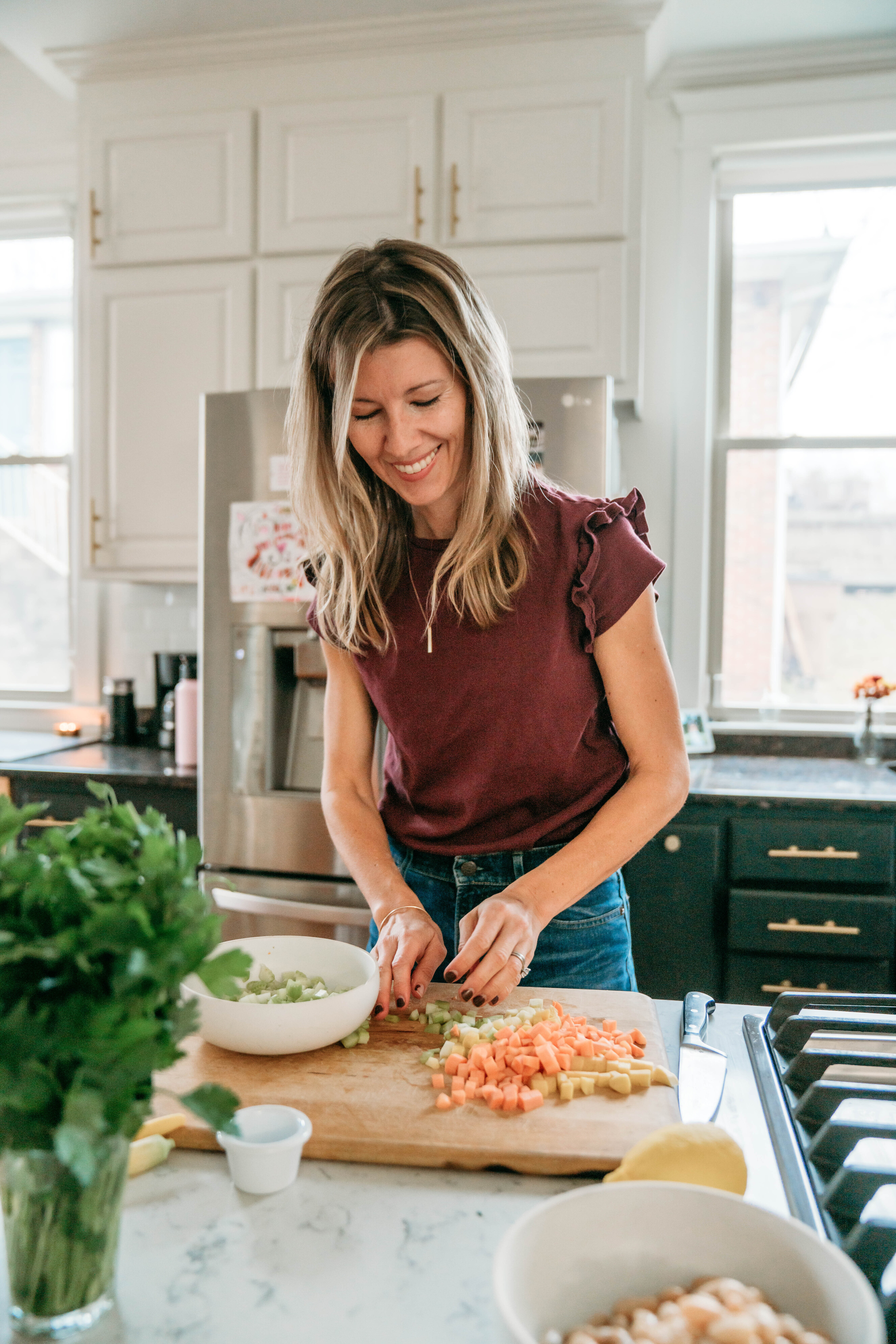Anna Watson Carl cooking in her kitchen