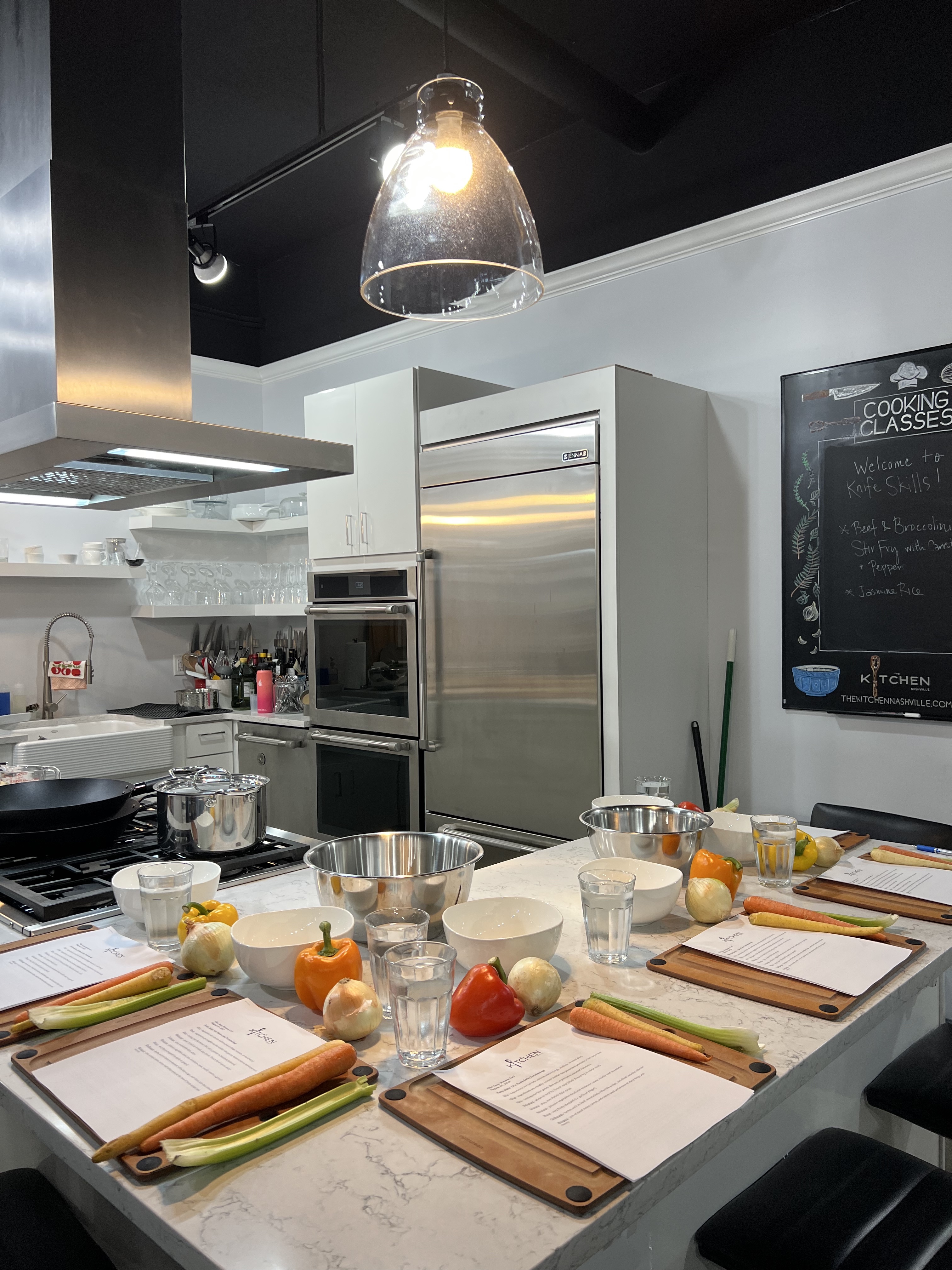 A kitchen prepared for a cooking class
